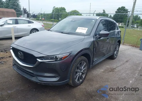 2019 Mazda Cx-5 Signature z USA, uszkodzony, nr VIN JM3KFBEY8K0616962